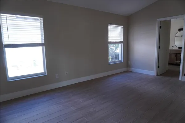 an empty room that has a window