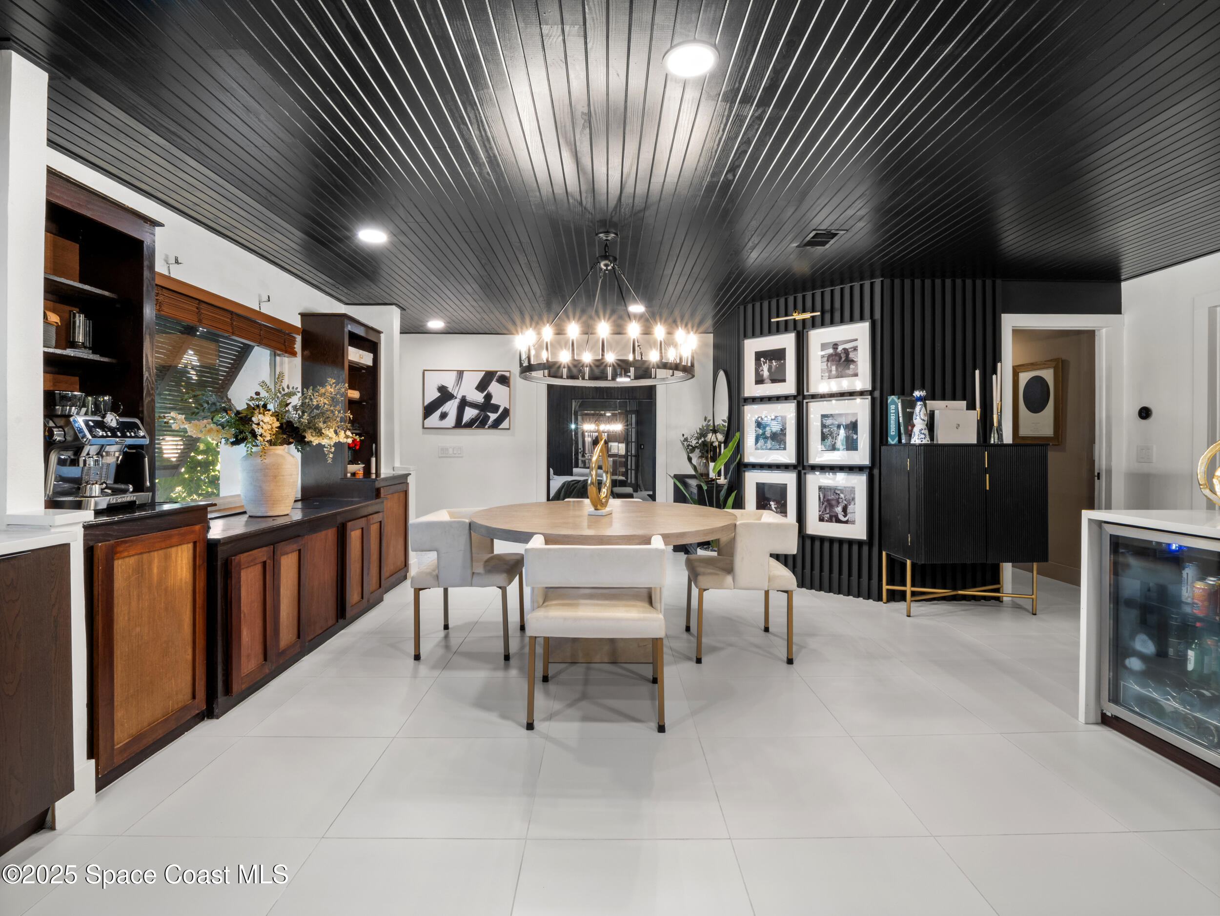 219 Sand Pine Road Indialantic, FL 32903 - Photo 3 of 38 a view of a dining room with furniture