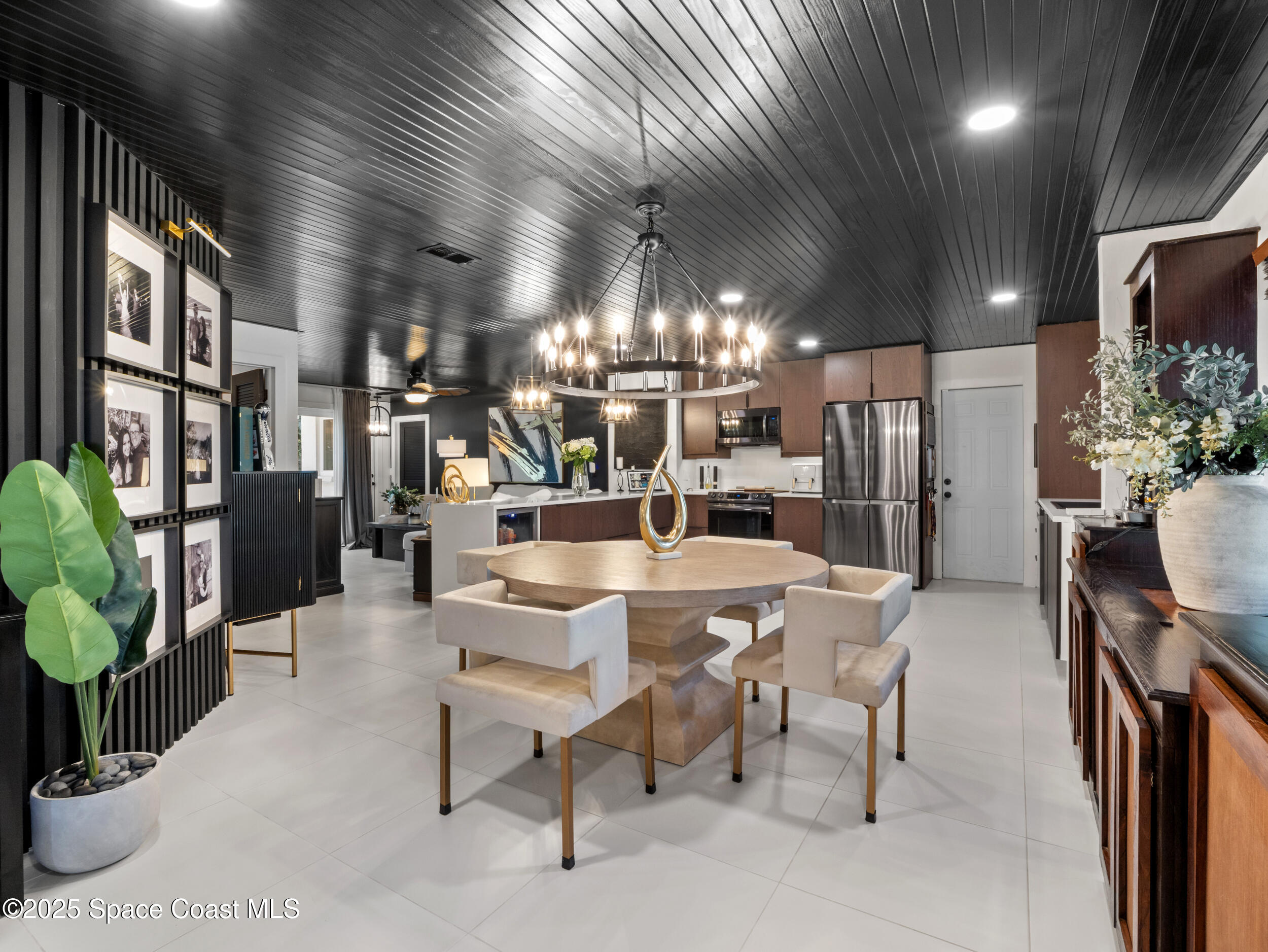 219 Sand Pine Road Indialantic, FL 32903 - Photo 9 of 38 a dining room with furniture