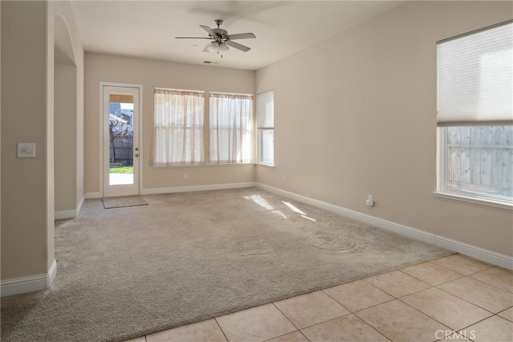 3065 Sweetwater Chico, CA 95973 - Photo 13 of 38 Family room with glass door to patio and rear yard