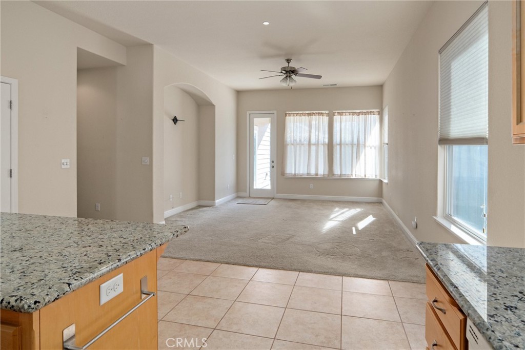 3065 Sweetwater Chico, CA 95973 - Photo 16 of 38 View from kitchen into family area and back yard