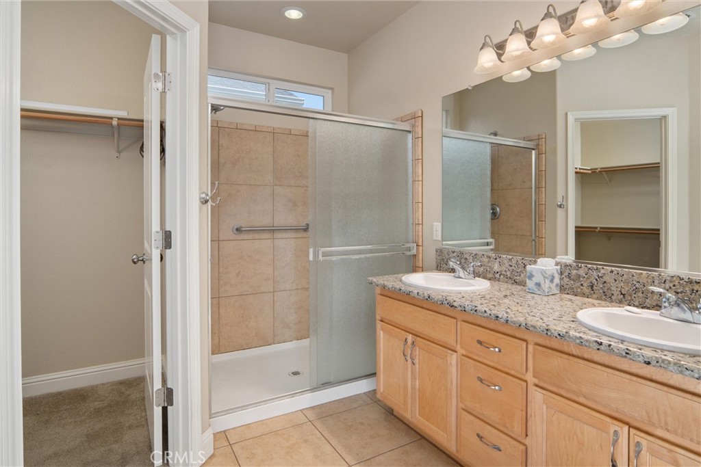 3065 Sweetwater Chico, CA 95973 - Photo 4 of 38 Primary bath features granite counters, HUGE shower, walk in closet and private toilet room