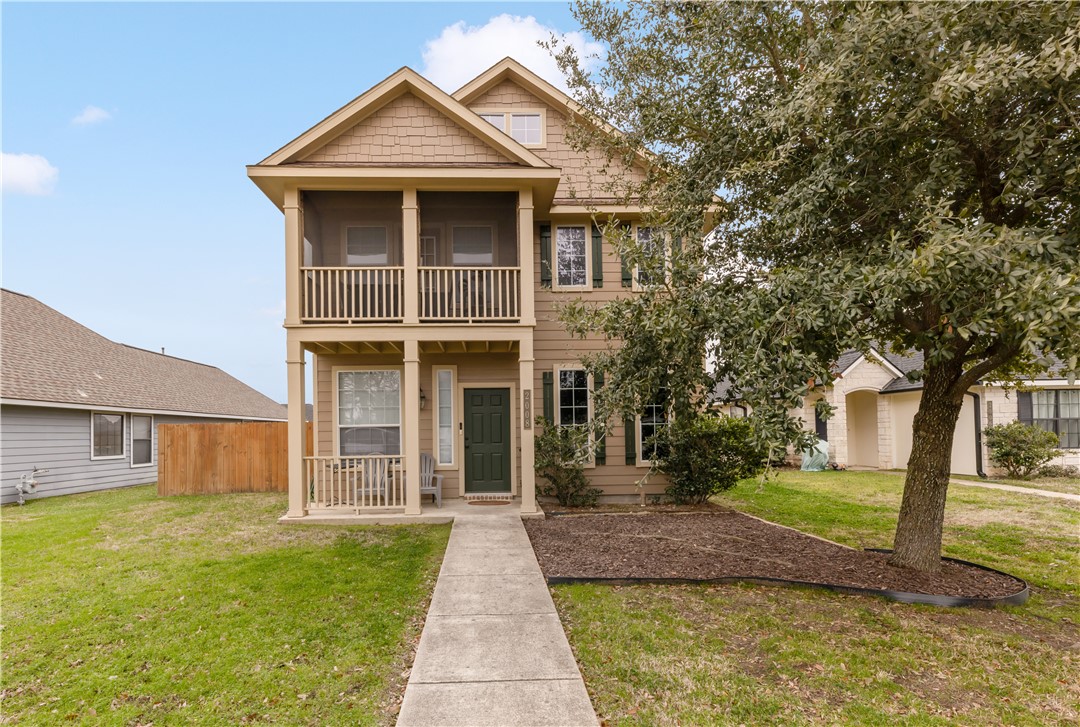 2008 Turning Leaf Drive Bryan, TX 77807 - Photo 1 of 20 a front view of a house with garden
