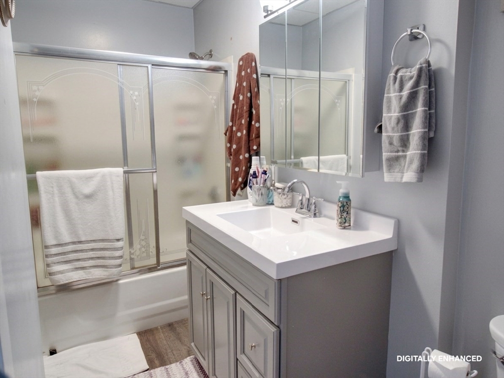 35 Windham Street Worcester, MA 01610 - Photo 12 of 39 a bathroom with a sink a toilet and shower