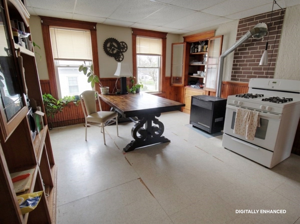 35 Windham Street Worcester, MA 01610 - Photo 17 of 39 a dining room with furniture and window