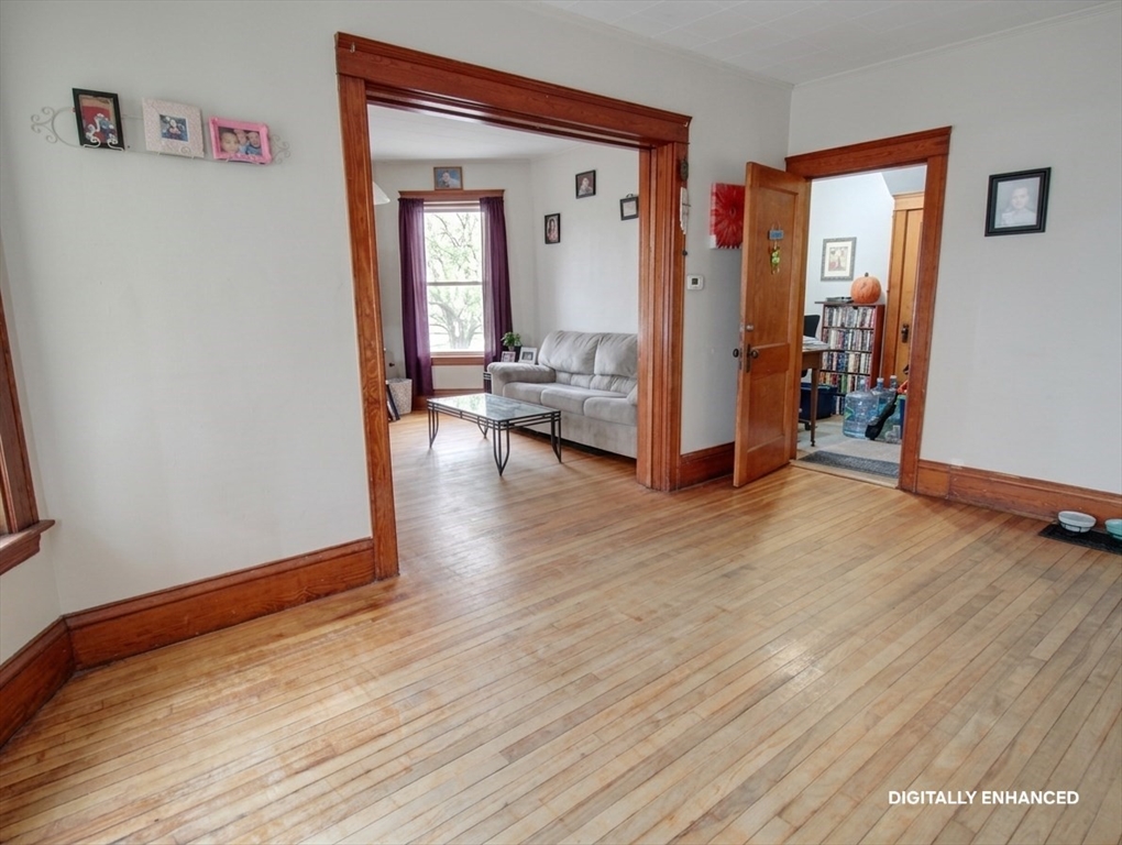 35 Windham Street Worcester, MA 01610 - Photo 24 of 39 a view of a room with wooden floor and furniture