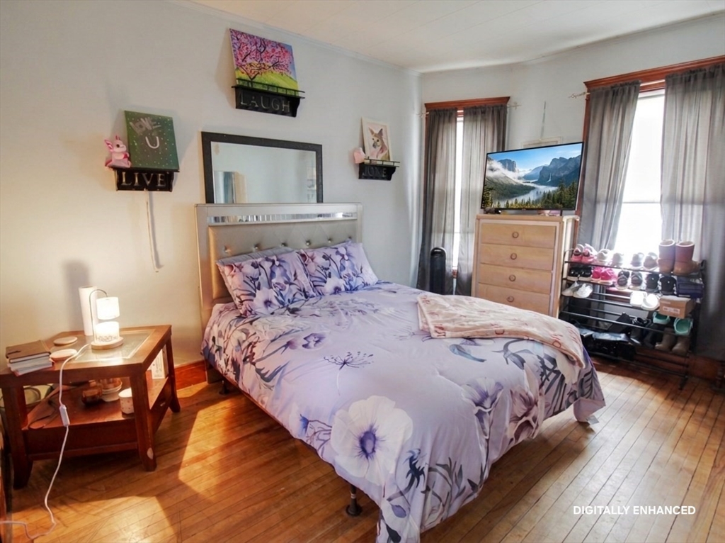 35 Windham Street Worcester, MA 01610 - Photo 26 of 39 a bedroom with bed and window