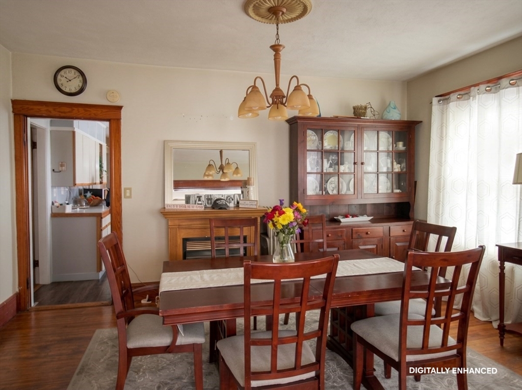 35 Windham Street Worcester, MA 01610 - Photo 7 of 39 a view of a dining room with furniture window and wooden floor