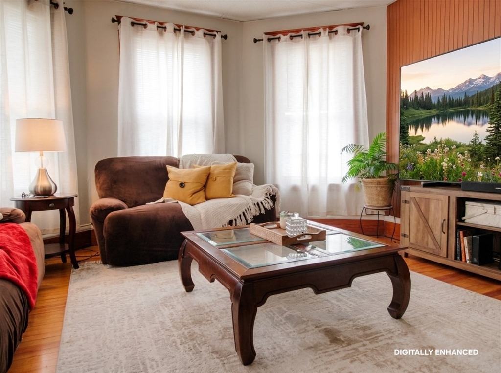 35 Windham Street Worcester, MA 01610 - Photo 8 of 39 a living room with furniture and a window