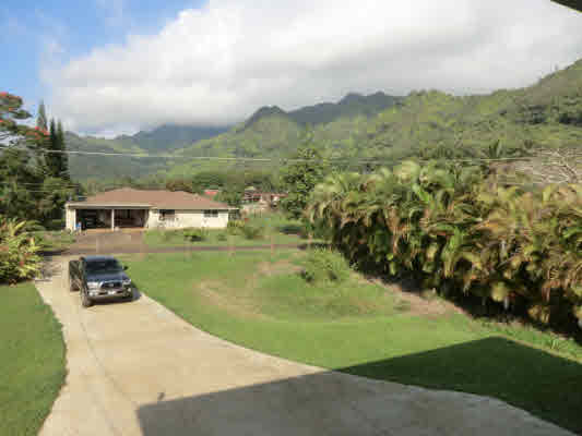 1736 Hulu Road, Unit 2 Kapaa, HI 96746 - Photo 4 of 12 a view of a lake with a mountain