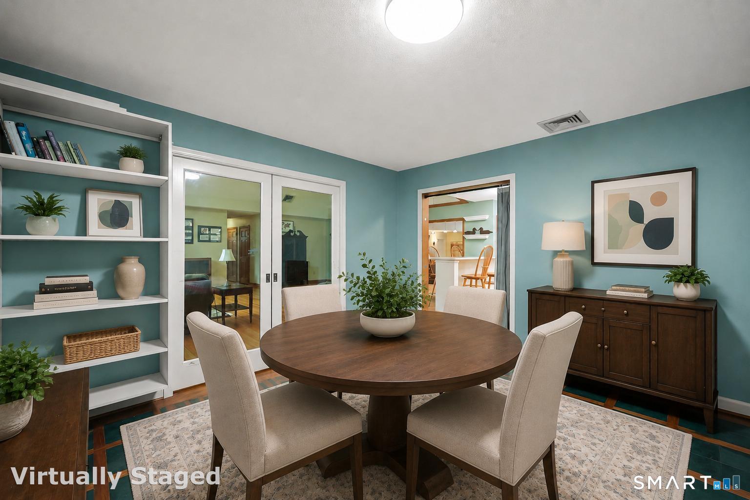 96 Spak Road Willington, CT 06279 - Photo 14 of 40 Dedicated dining room with glass pocket doors opening to living room & easy access to kitchen.