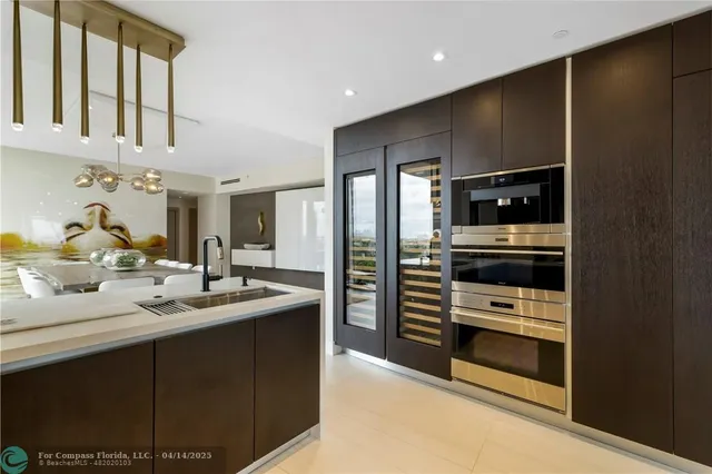 a spacious bedroom with a large window and a bed