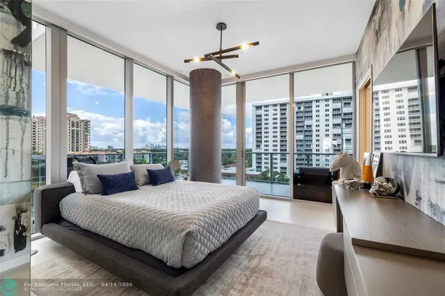 a bedroom with a bed and a couch