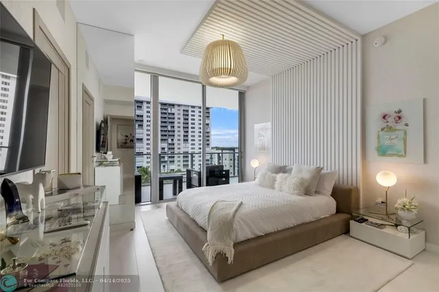 a view of a hallway with washer and dryer