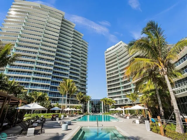 a living room with furniture and a view of living room