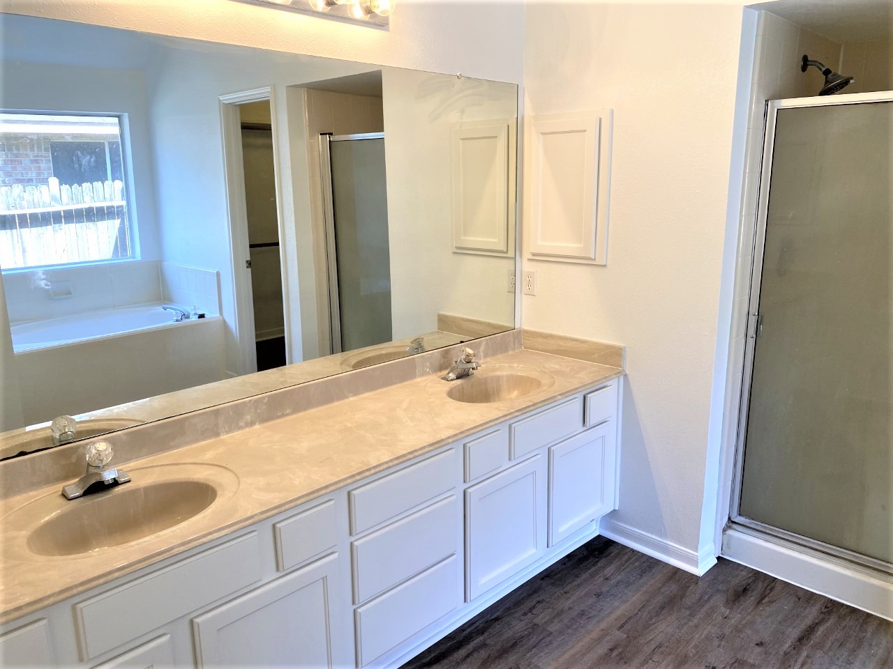 3011 Pheasant Run Humble, TX 77396 - Photo 9 of 17 a bathroom with a sink and a mirror