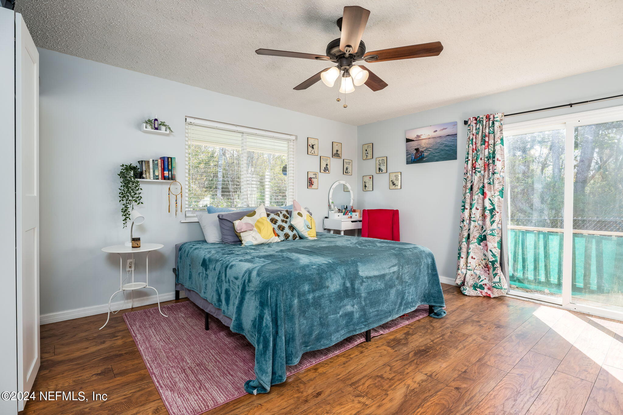 320 Katnack Road St. Augustine, FL 32095 - Photo 16 of 33 a bed sitting in a bedroom next to a window