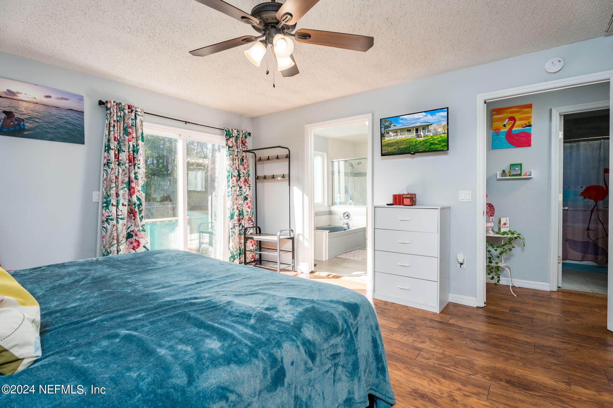 320 Katnack Road St. Augustine, FL 32095 - Photo 17 of 33 a spacious bedroom with a bed and a view of bedroom
