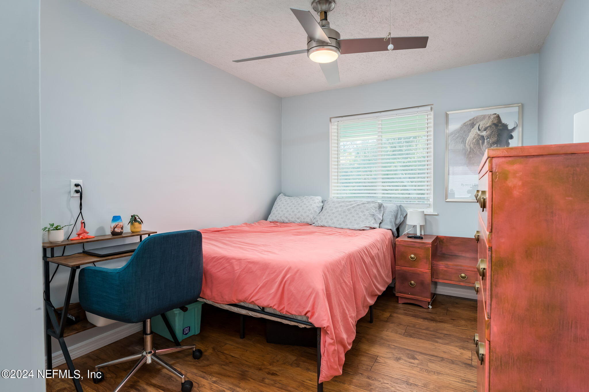 320 Katnack Road St. Augustine, FL 32095 - Photo 23 of 33 a bedroom with a bed dresser and a window