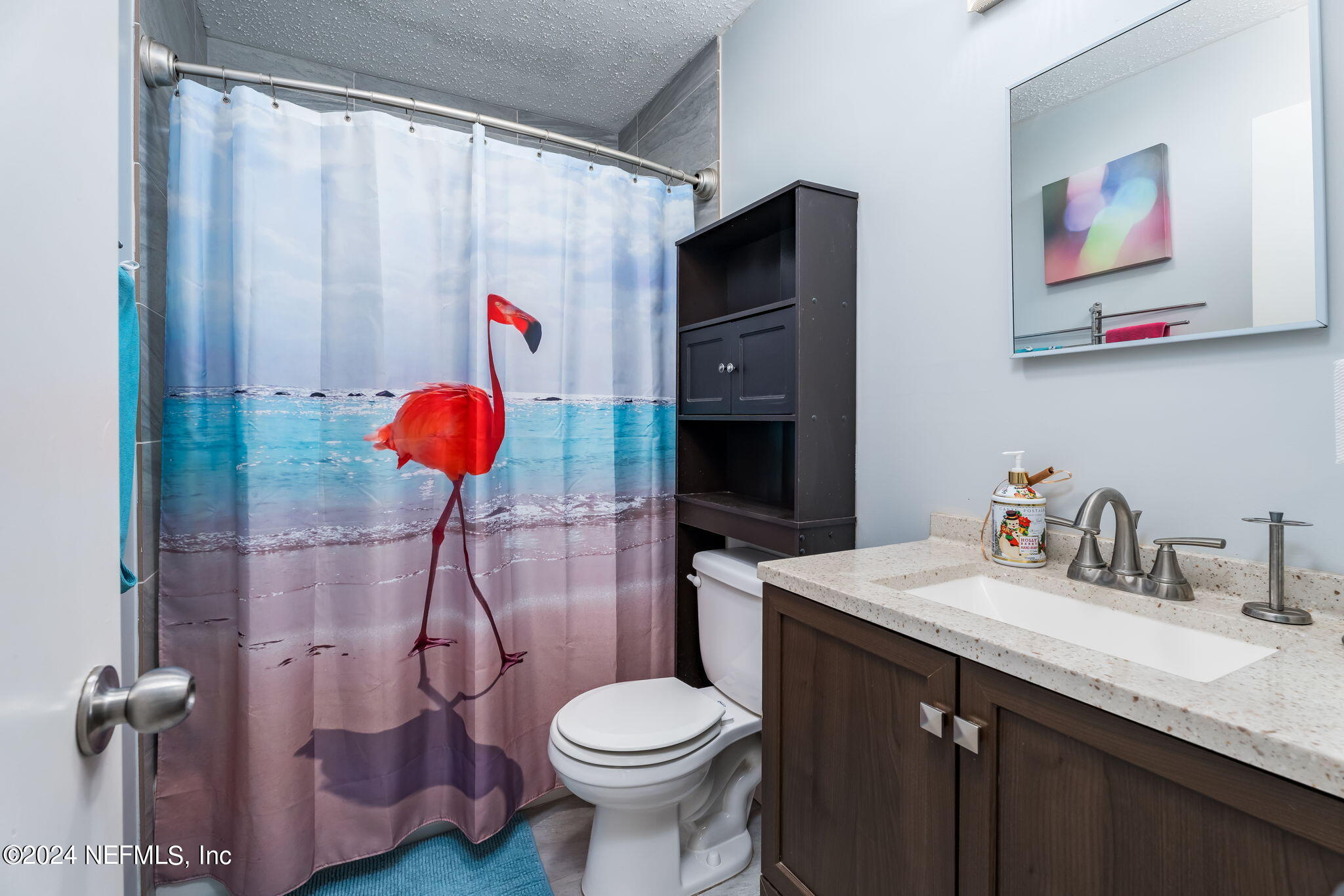320 Katnack Road St. Augustine, FL 32095 - Photo 24 of 33 a bathroom with a sink toilet and shower