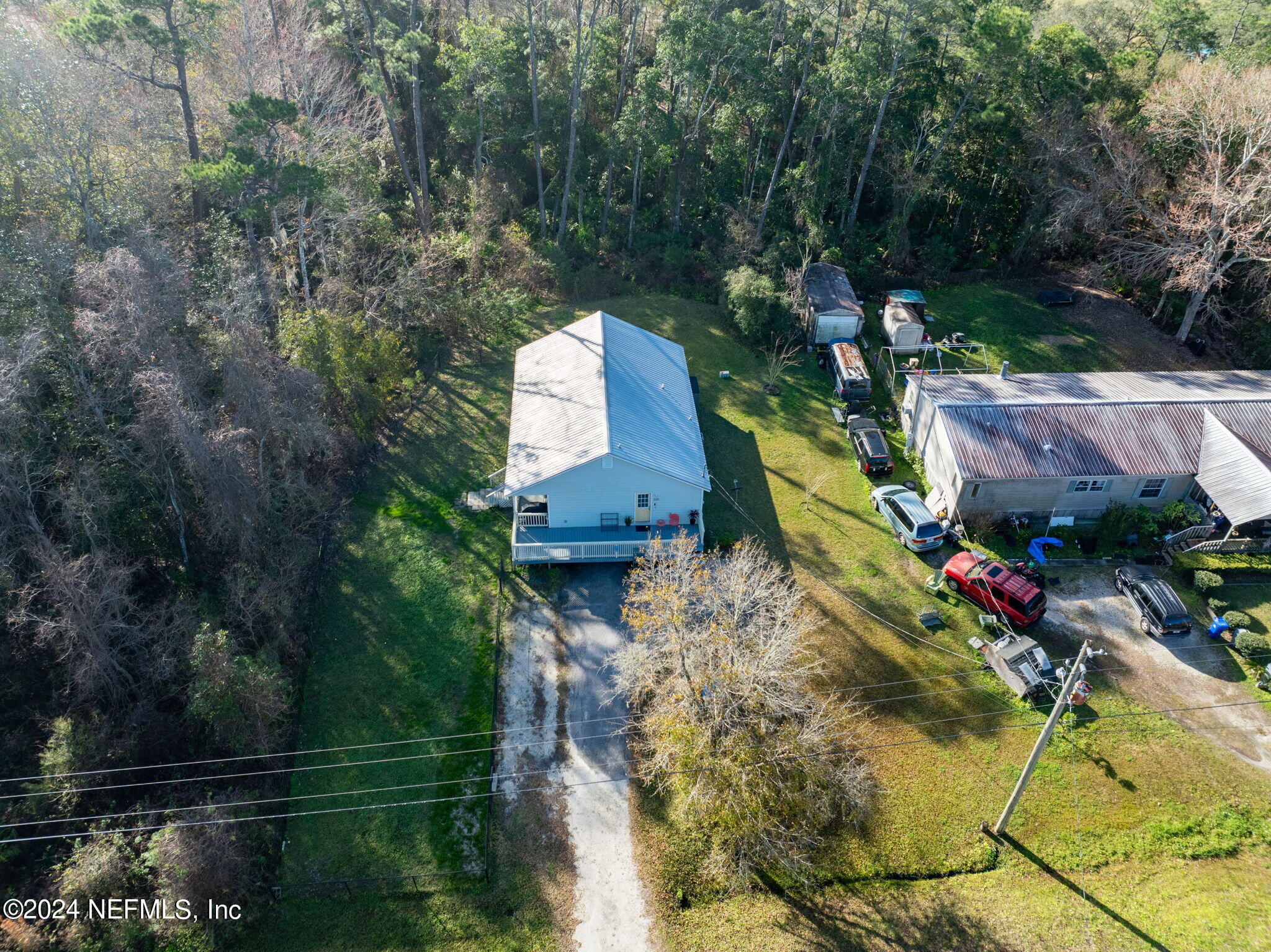 320 Katnack Road St. Augustine, FL 32095 - Photo 29 of 33 an aerial view of a house with a garden