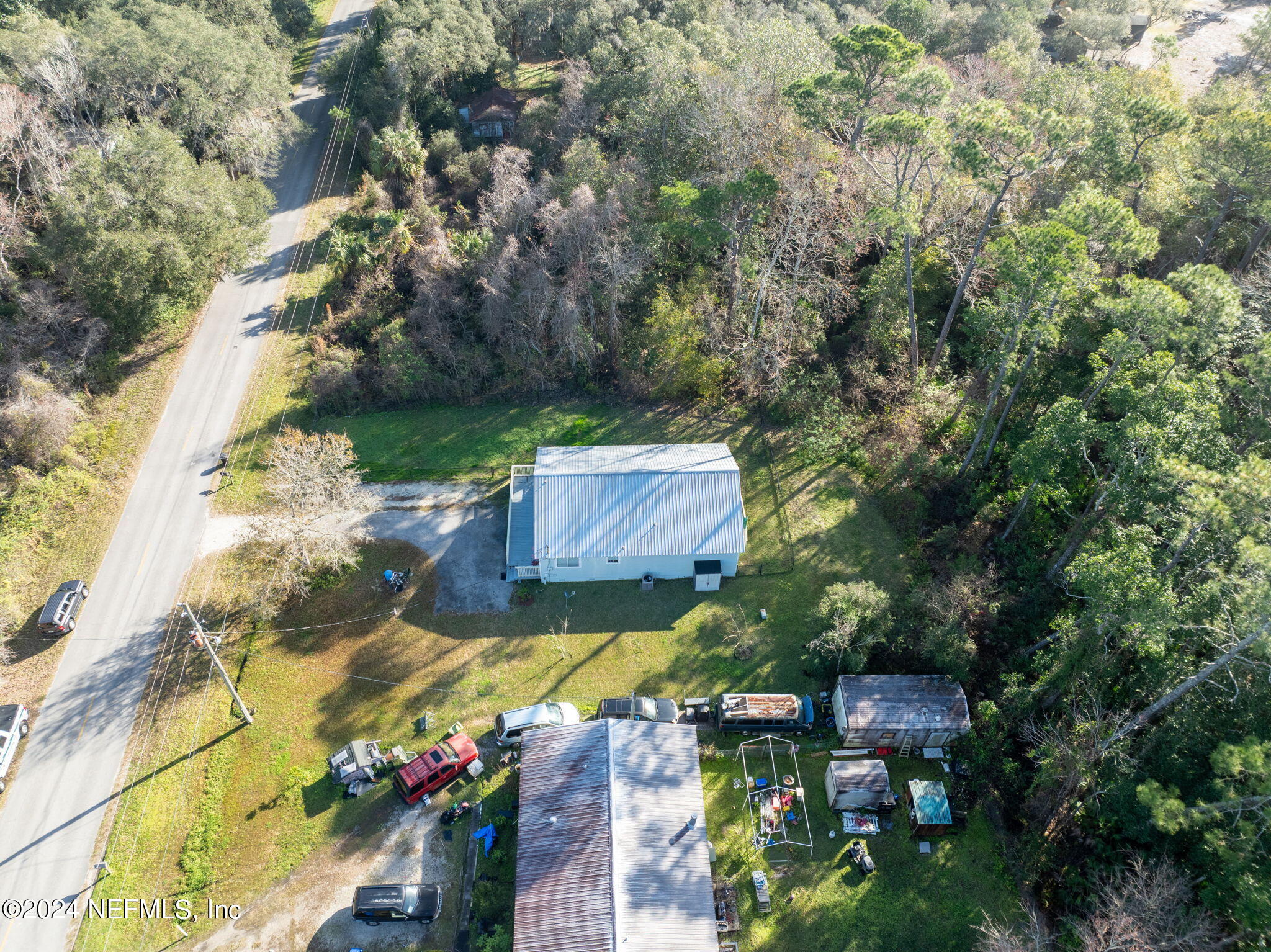 320 Katnack Road St. Augustine, FL 32095 - Photo 31 of 33 an aerial view of a house with yard swimming pool and outdoor seating
