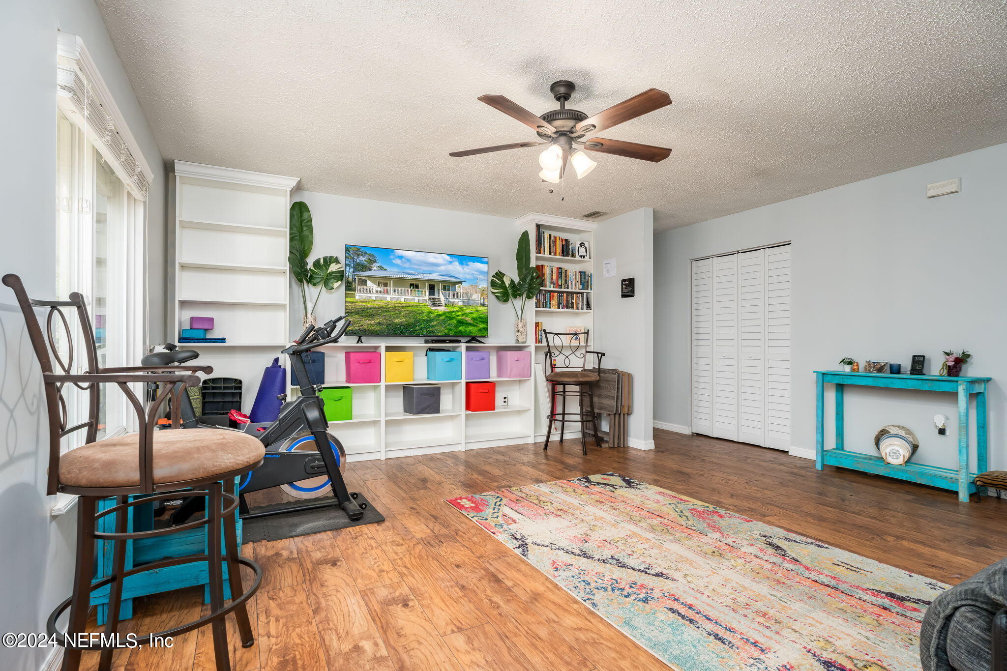 320 Katnack Road St. Augustine, FL 32095 - Photo 6 of 33 a living room filled with furniture and a wooden floor