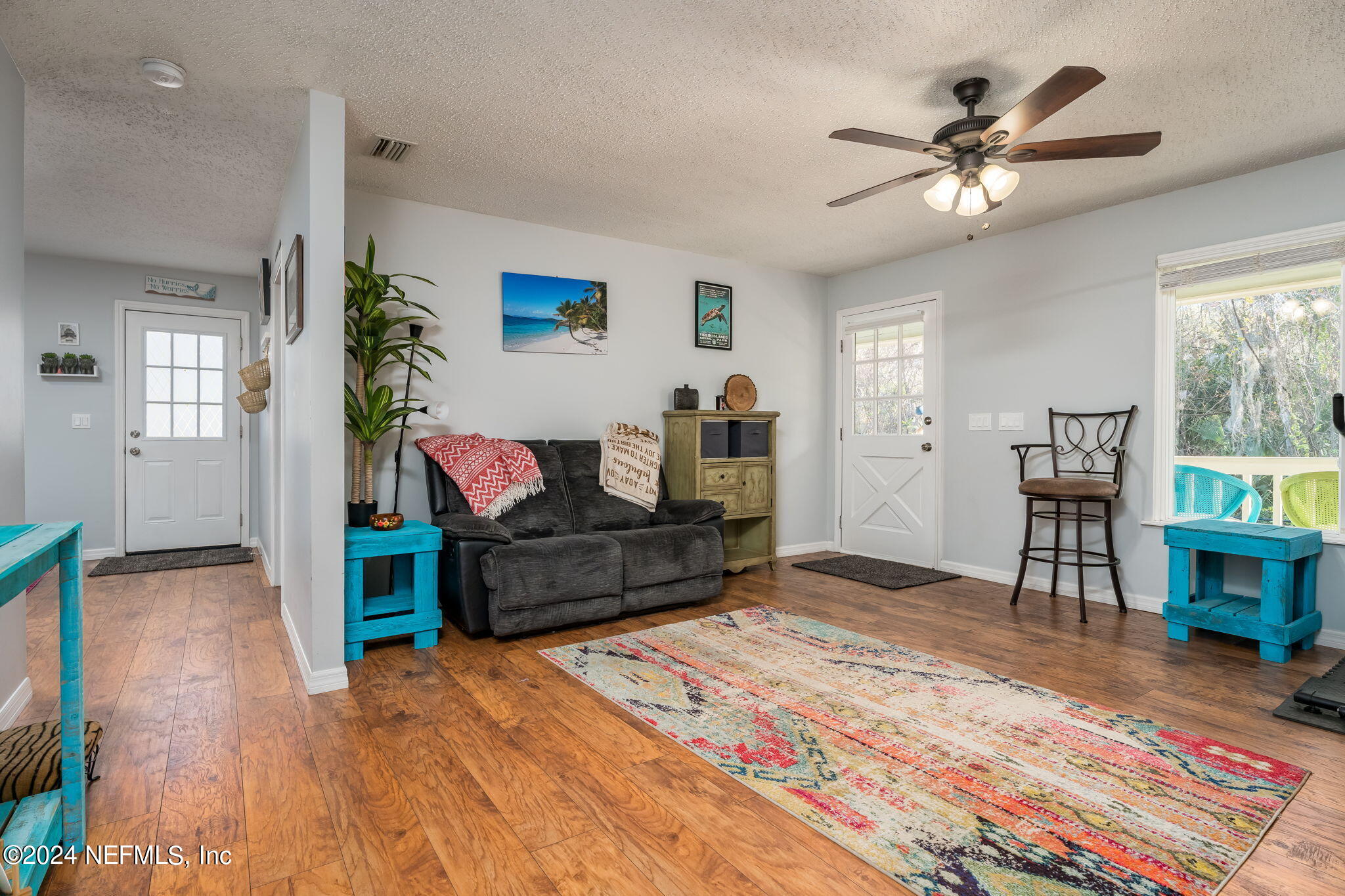320 Katnack Road St. Augustine, FL 32095 - Photo 7 of 33 a living room with furniture and wooden floor