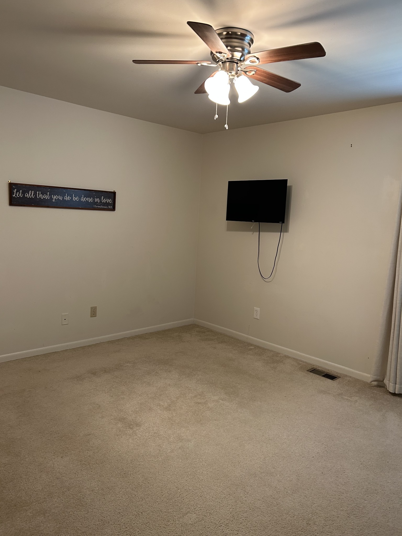 604 Granville Road, Unit 604 Franklin, TN 37064 - Photo 13 of 24 an empty room with a ceiling fan and a window