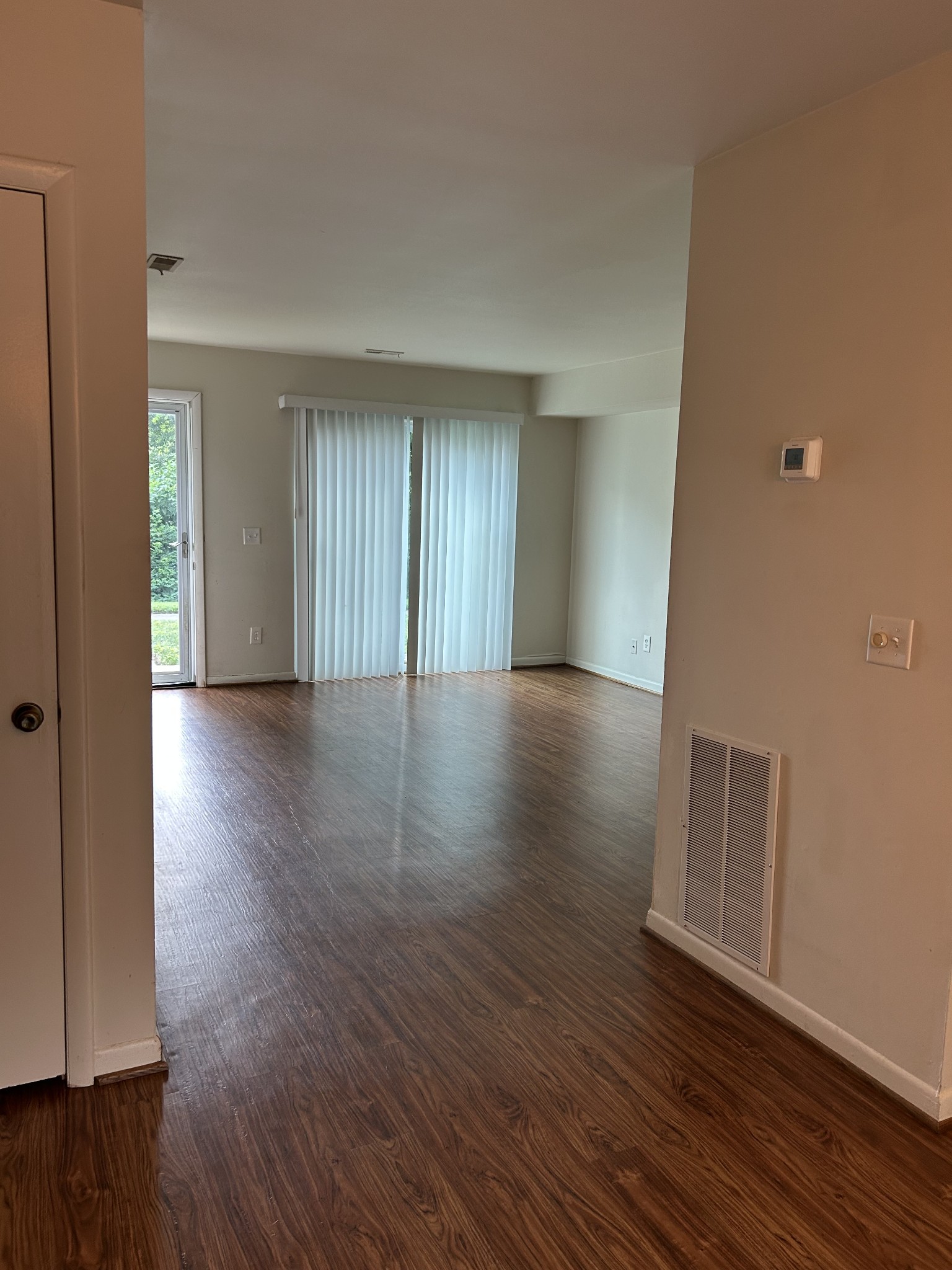 604 Granville Road, Unit 604 Franklin, TN 37064 - Photo 10 of 24 a view of an empty room with wooden floor