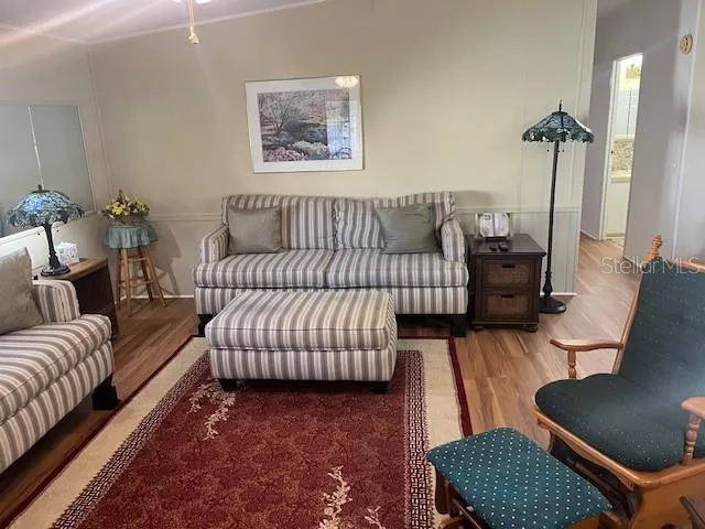 a bedroom with furniture and a couch