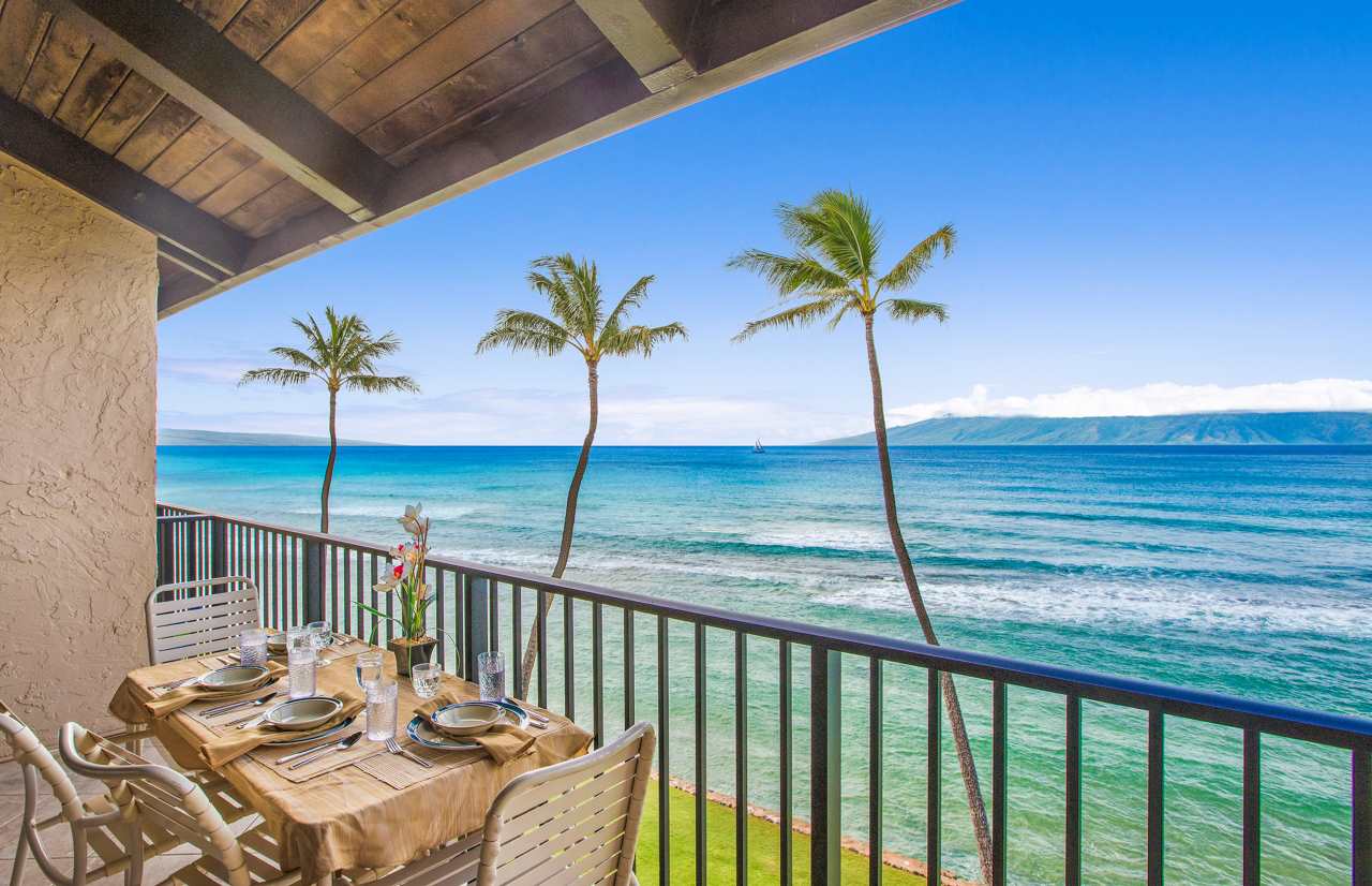 a view of a balcony with furniture