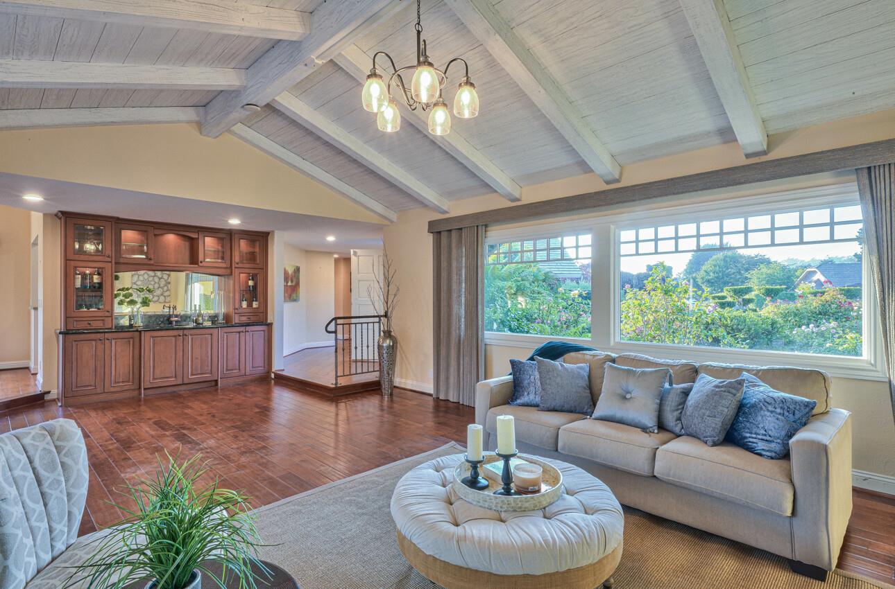 8022 River Place Carmel, CA 93923 - Photo 11 of 39 a living room with furniture and a large window