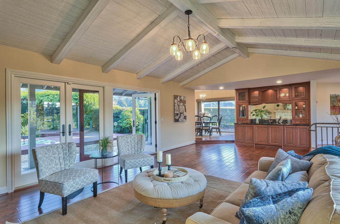 8022 River Place Carmel, CA 93923 - Photo 12 of 39 a living room with furniture and a large window