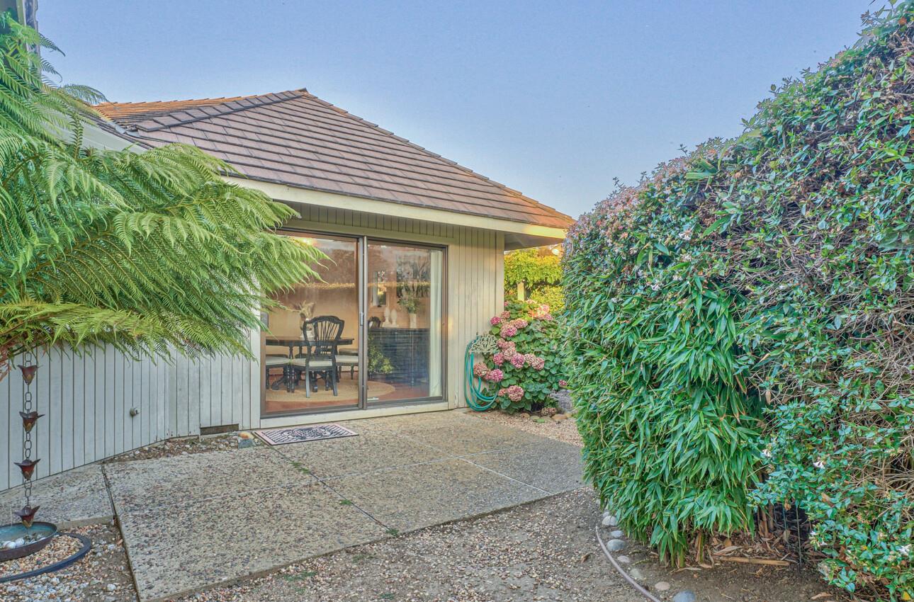 8022 River Place Carmel, CA 93923 - Photo 15 of 39 a front view of a house with garden