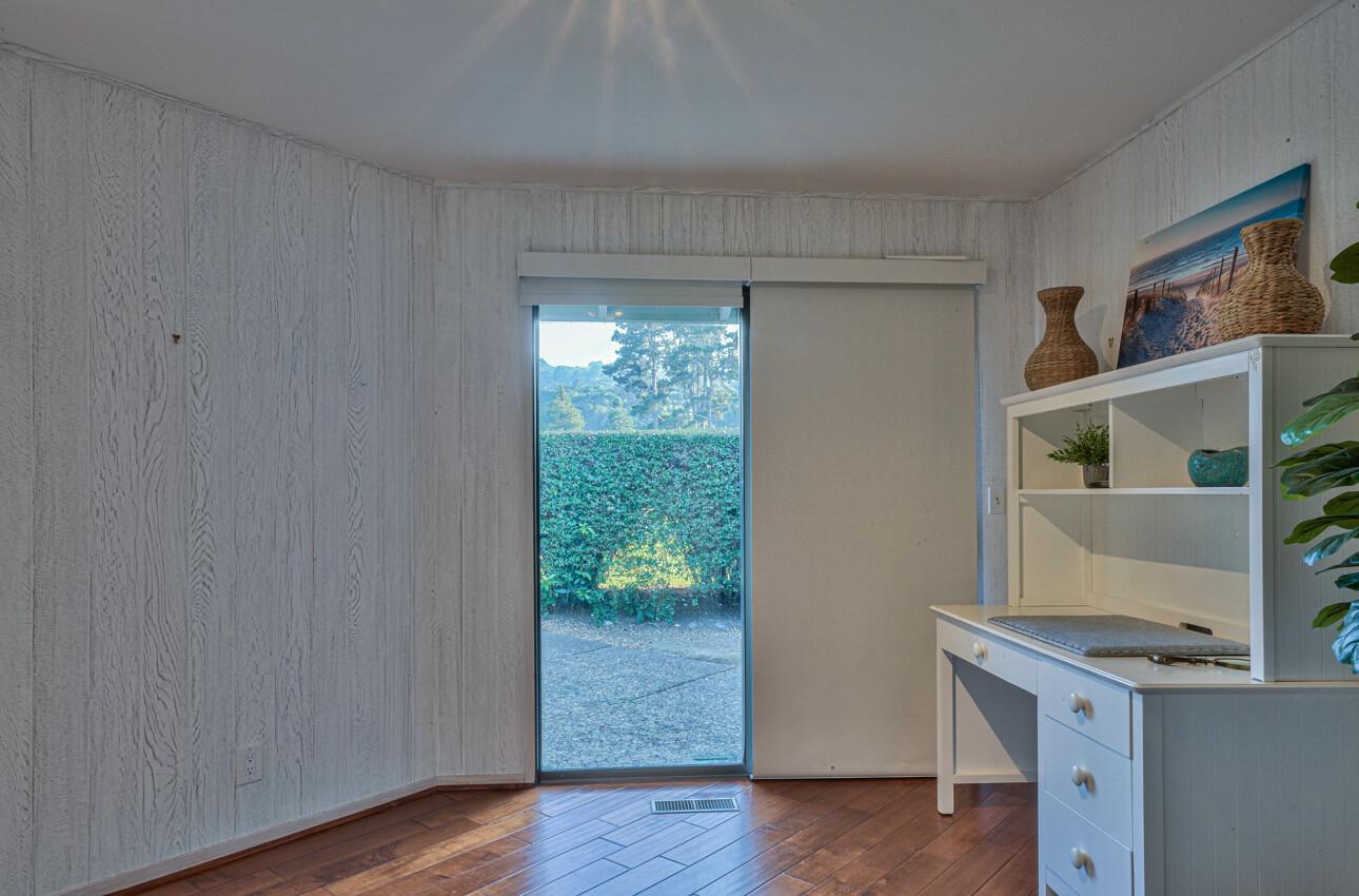 8022 River Place Carmel, CA 93923 - Photo 30 of 39 a view of cabinets and wooden floor