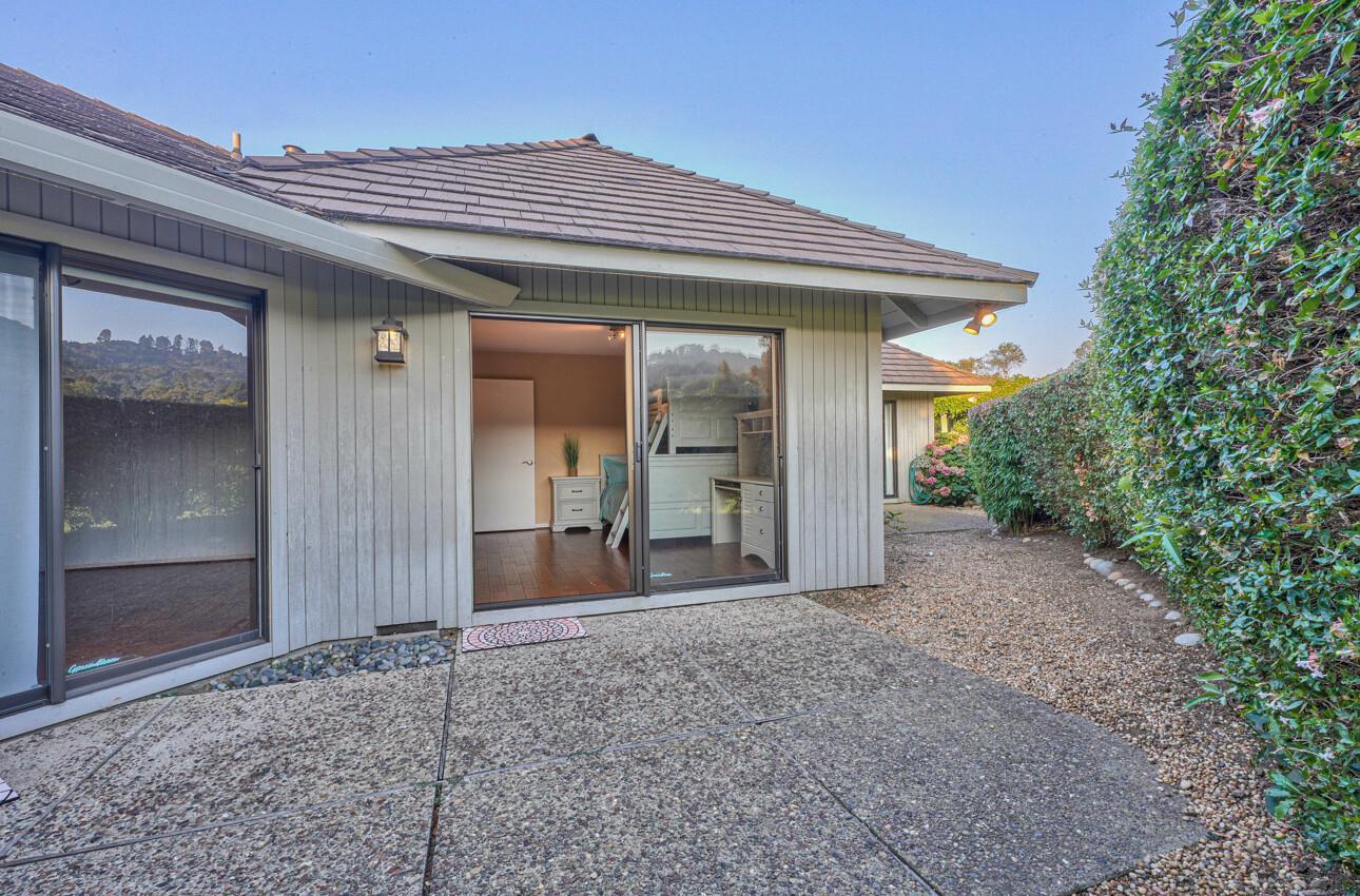 8022 River Place Carmel, CA 93923 - Photo 32 of 39 a view of a house with potted plants