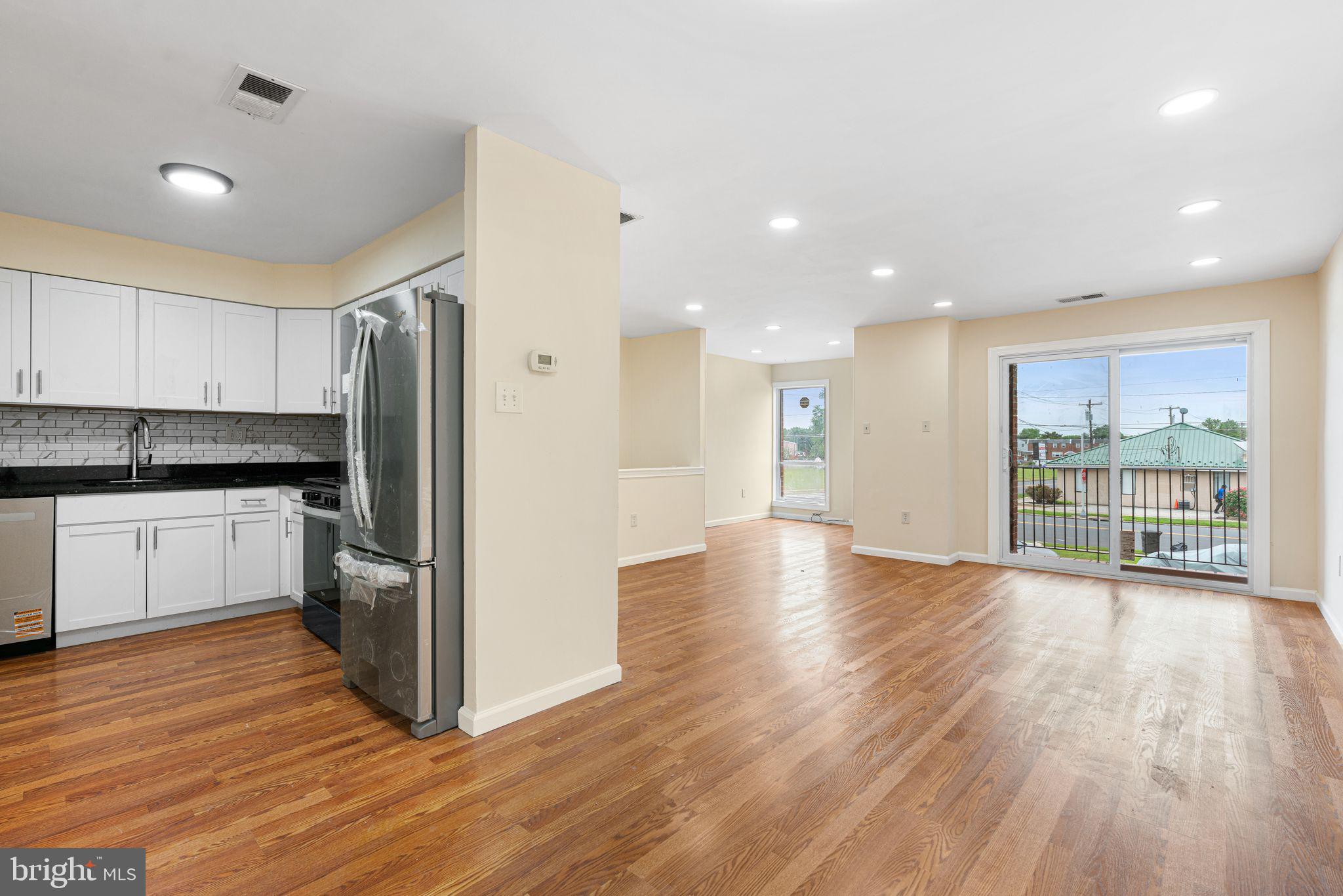 3281 Red Lion Road, Unit 2 Philadelphia, PA 19114 - Photo 1 of 15 Spacious open-concept living area.