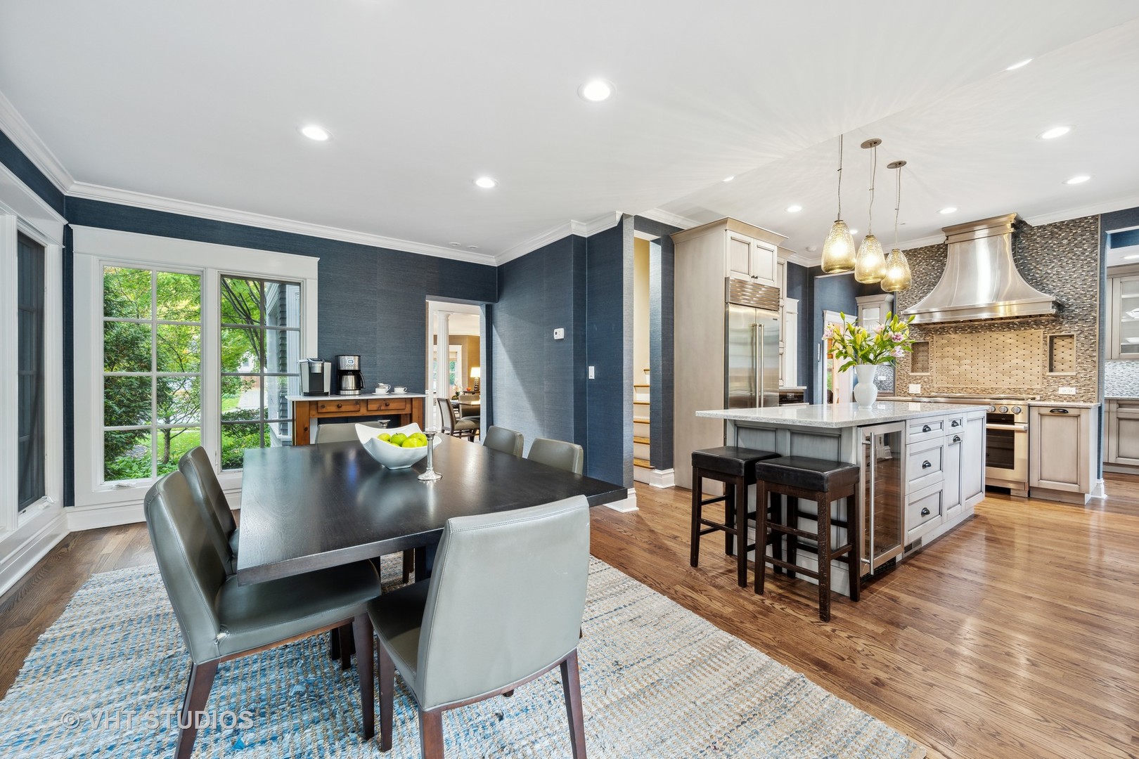 527 Cherry Street Winnetka, IL 60093 - Photo 11 of 43 a living room with stainless steel appliances granite countertop furniture dining table a large window and kitchen view