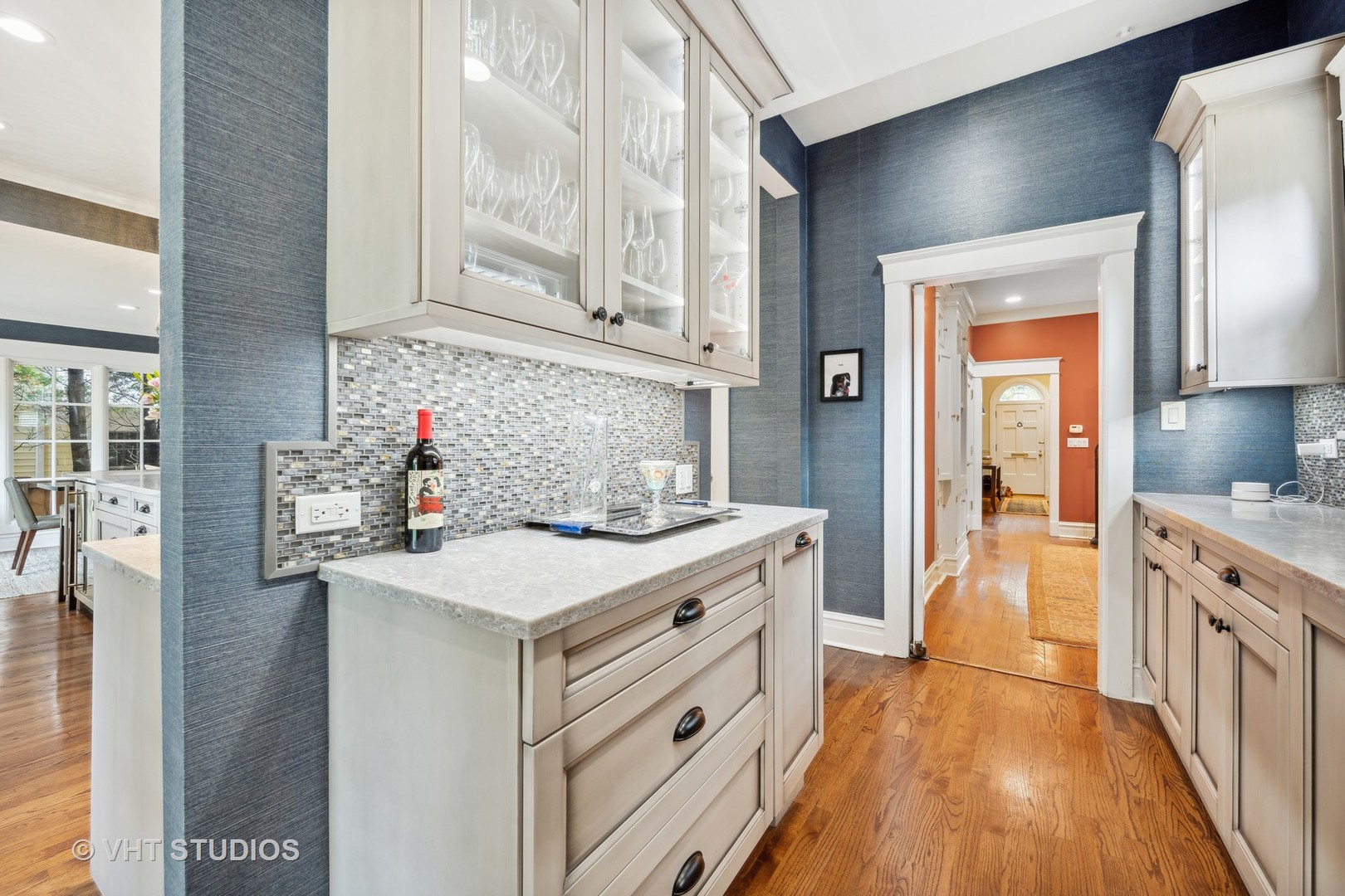 527 Cherry Street Winnetka, IL 60093 - Photo 14 of 43 a kitchen with granite countertop a sink stove and cabinets