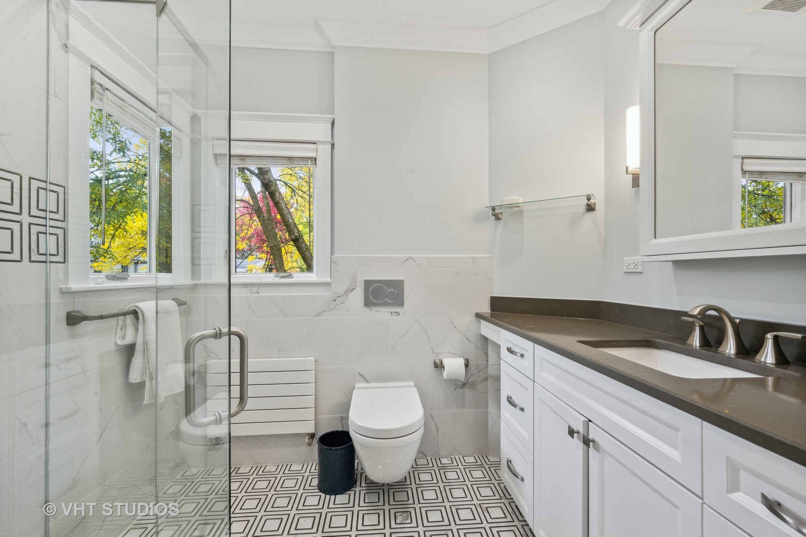 527 Cherry Street Winnetka, IL 60093 - Photo 25 of 43 a bathroom with a granite countertop sink a toilet and a window