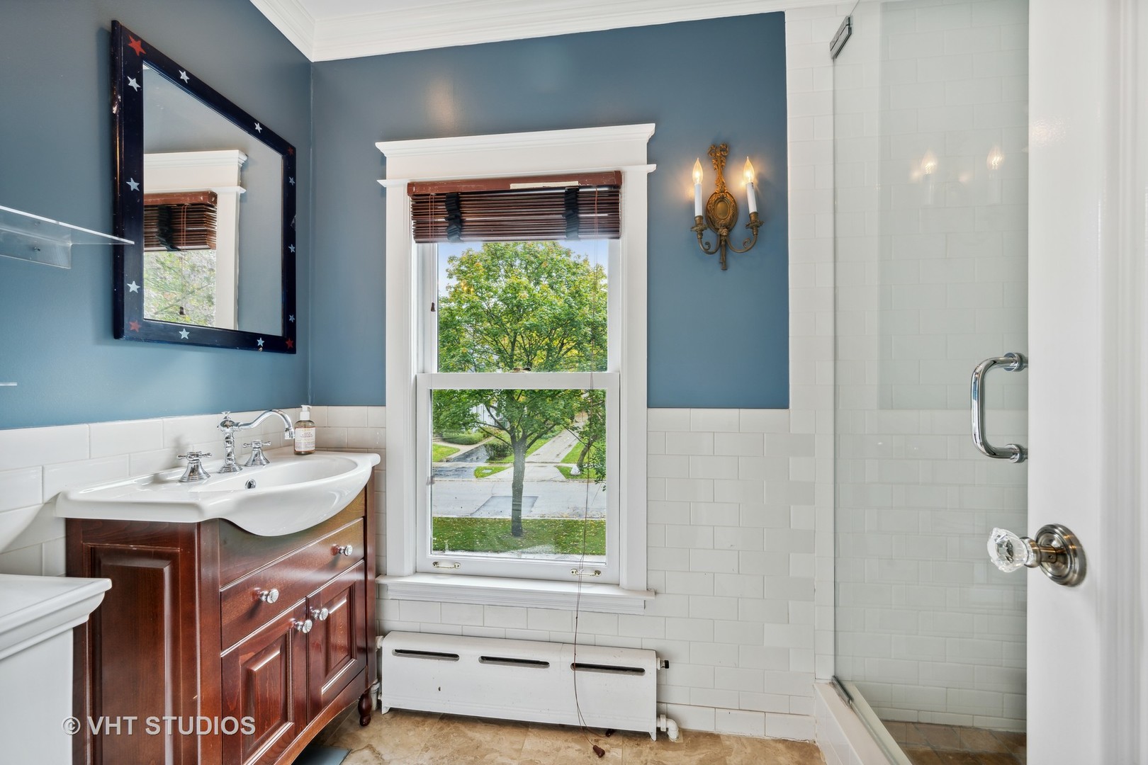 527 Cherry Street Winnetka, IL 60093 - Photo 28 of 43 a bathroom with a sink and a mirror