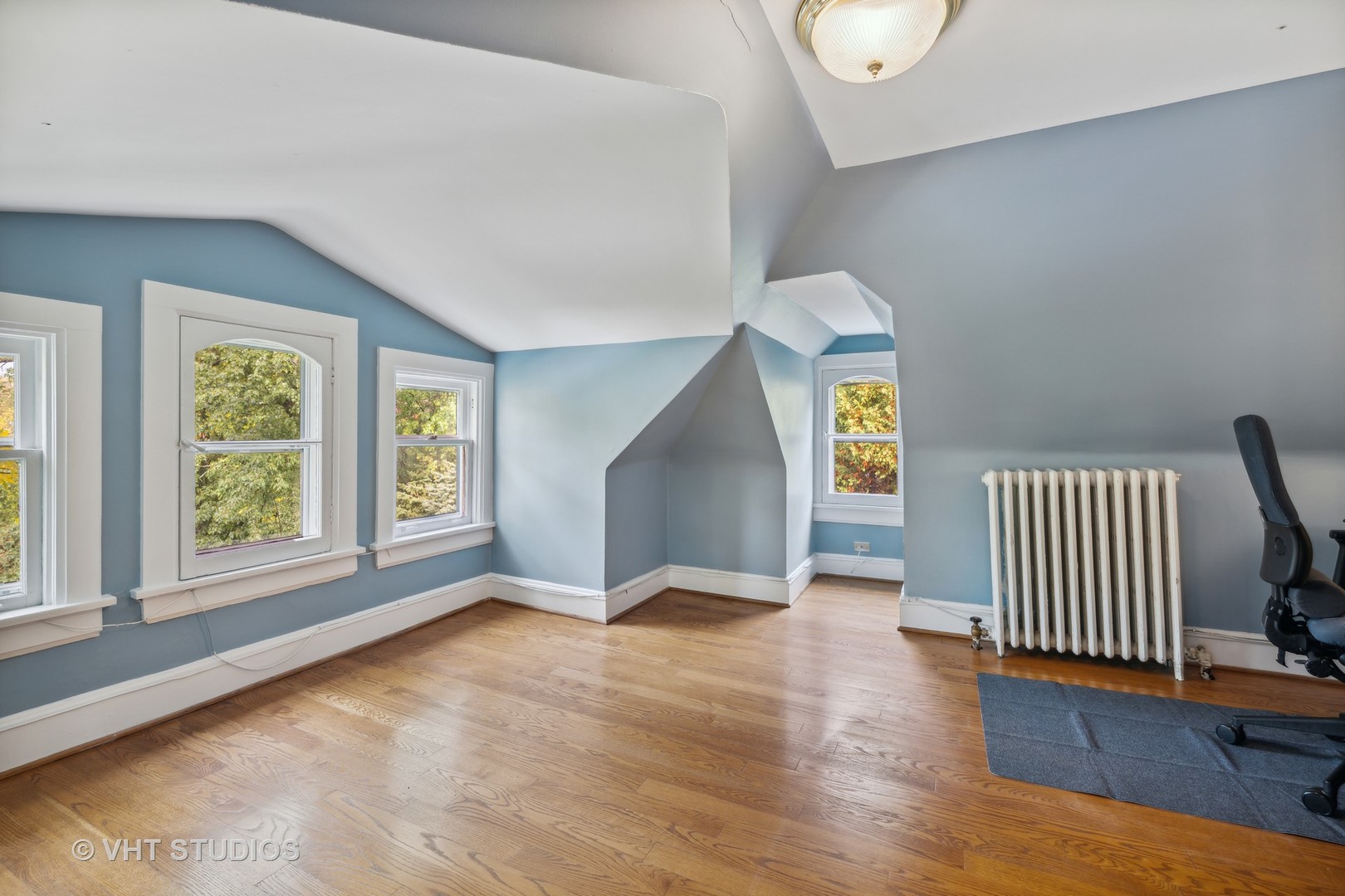 527 Cherry Street Winnetka, IL 60093 - Photo 29 of 43 an empty room with wooden floor and windows