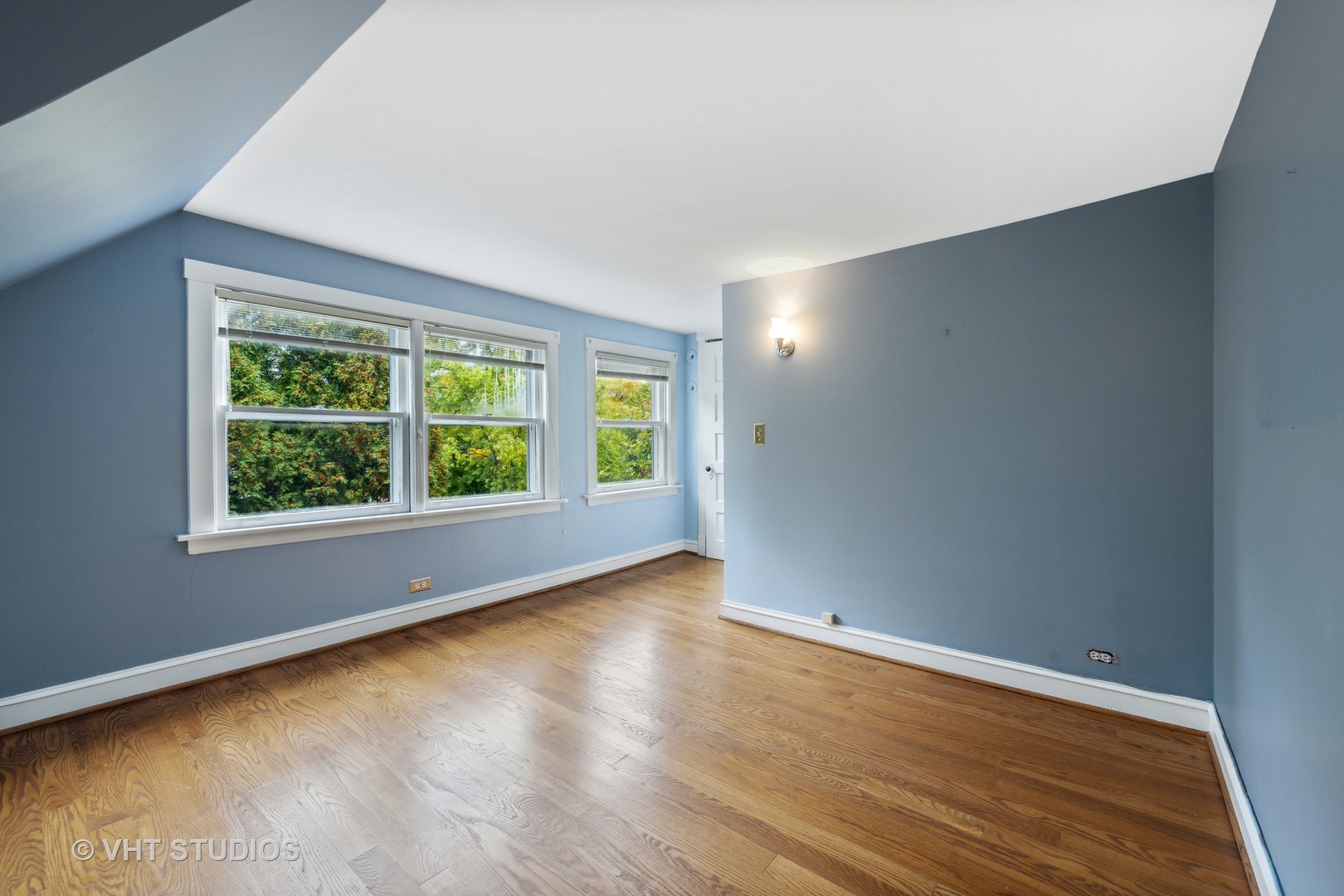 527 Cherry Street Winnetka, IL 60093 - Photo 30 of 43 an empty room with wooden floor and windows