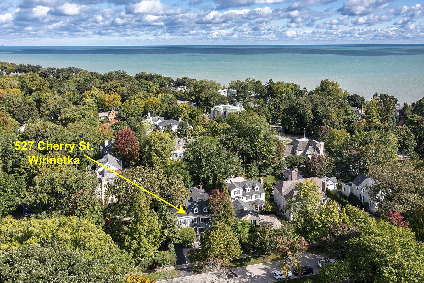 527 Cherry Street Winnetka, IL 60093 - Photo 3 of 43 an aerial view of a house with a yard and lake view
