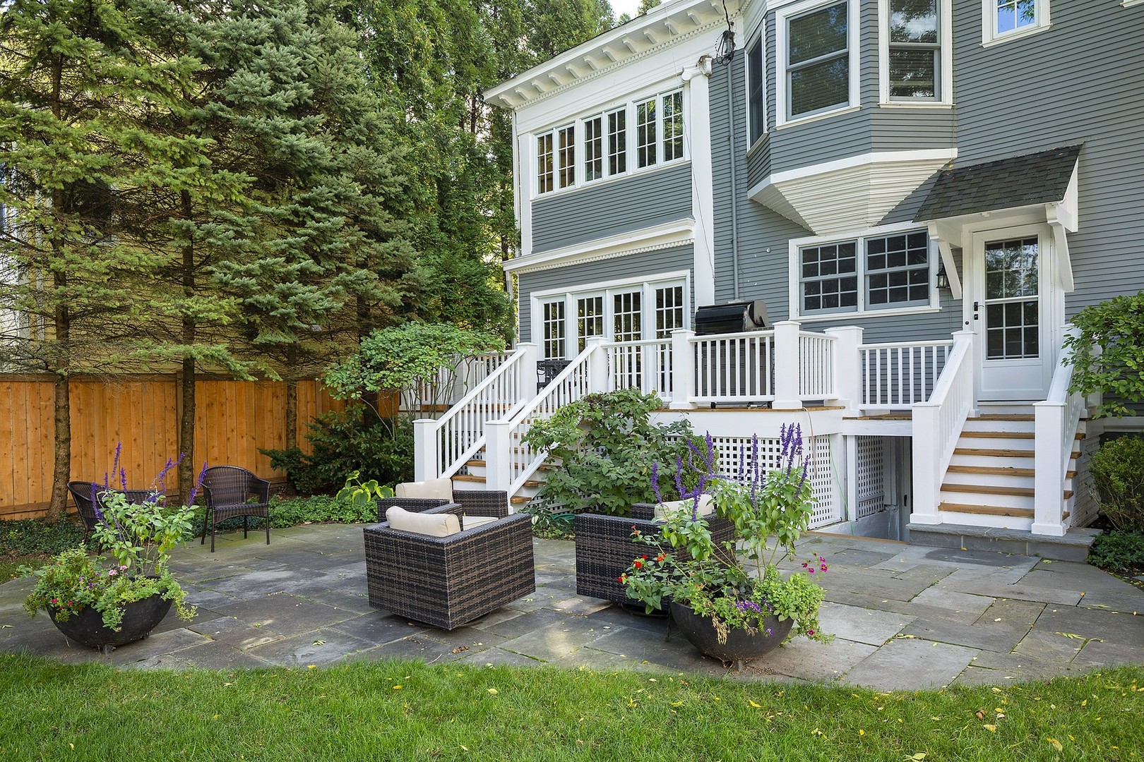 527 Cherry Street Winnetka, IL 60093 - Photo 36 of 43 a front view of a house with a garden