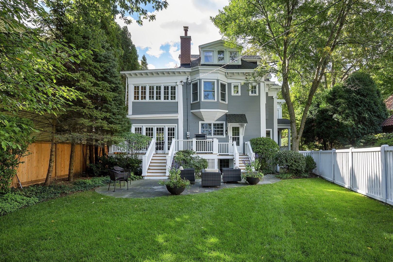 527 Cherry Street Winnetka, IL 60093 - Photo 37 of 43 a view of a house with backyard and garden