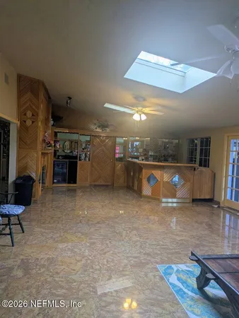 a view of a living room and a couch