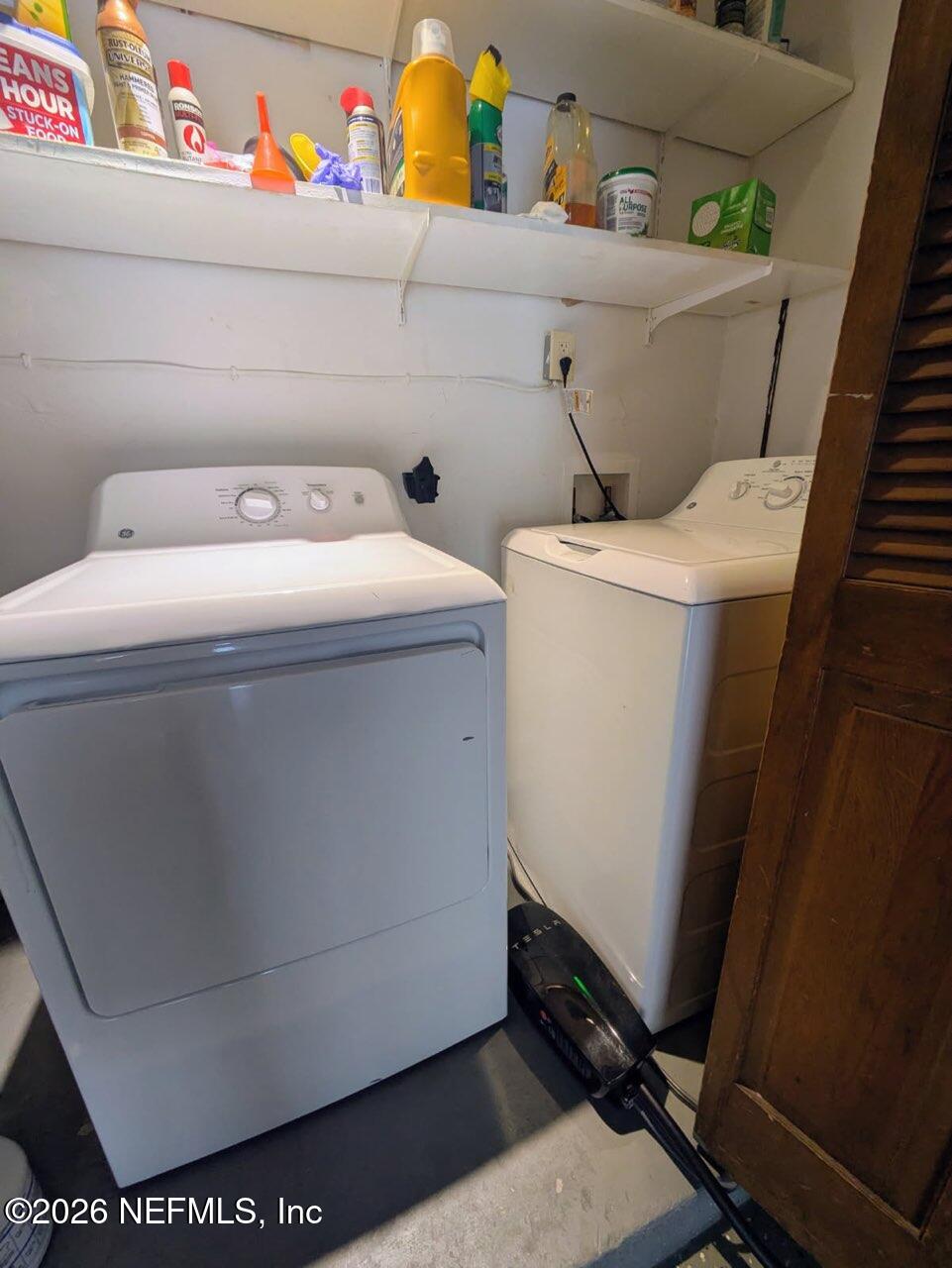 4442 River Trail Road Jacksonville, FL 32277 - Photo 22 of 38 a utility room with dryer and washer