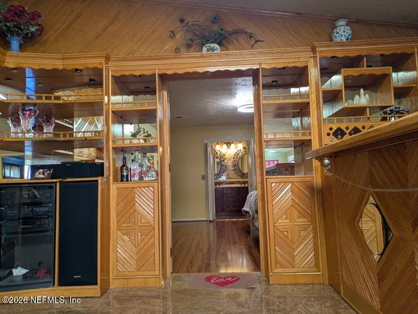 a view of small space with wooden floor